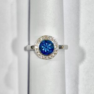 9ct white gold blue topaz and diamond halo ring