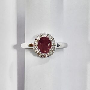 18ct white gold oval ruby and diamond halo ring